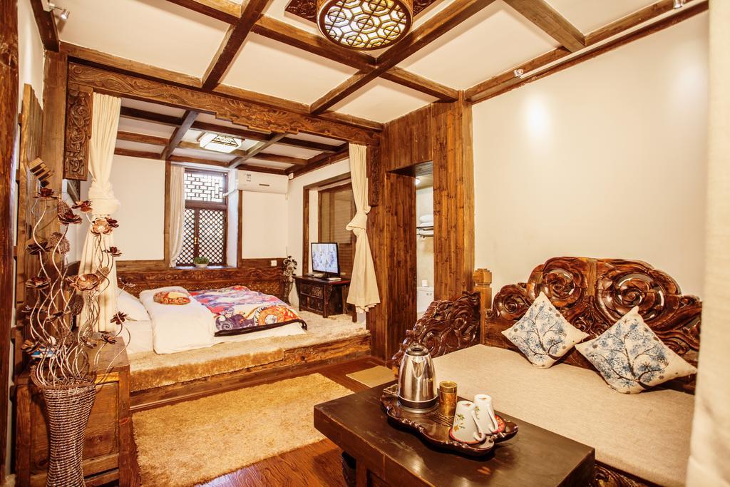 XI Tang Exquisite Hotel Лицзян Номер фото