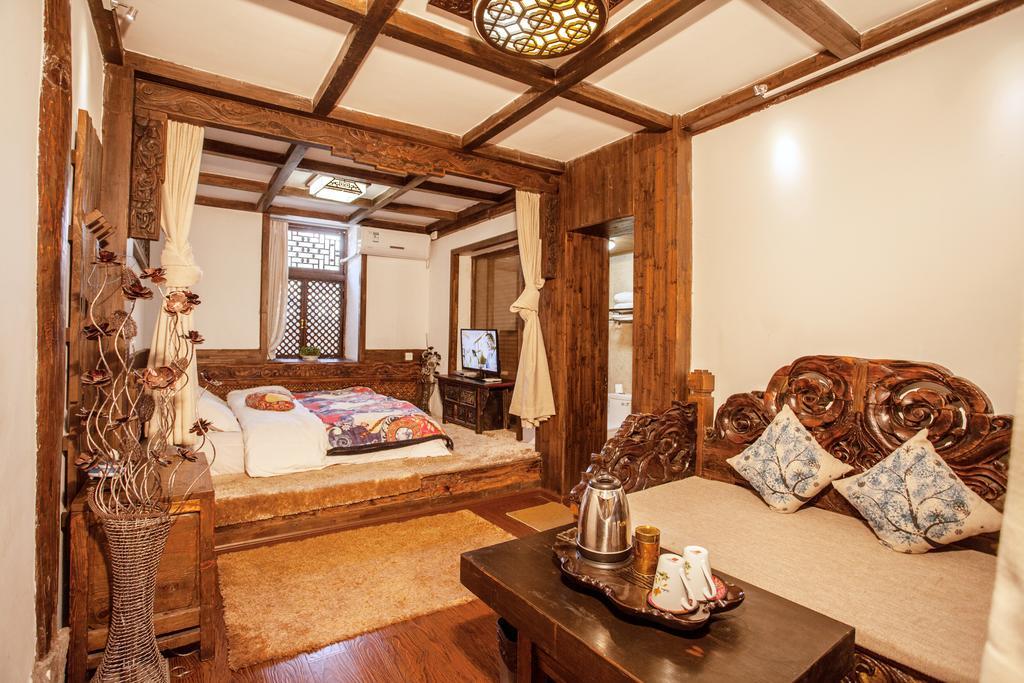 XI Tang Exquisite Hotel Лицзян Номер фото