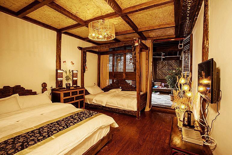 XI Tang Exquisite Hotel Лицзян Номер фото