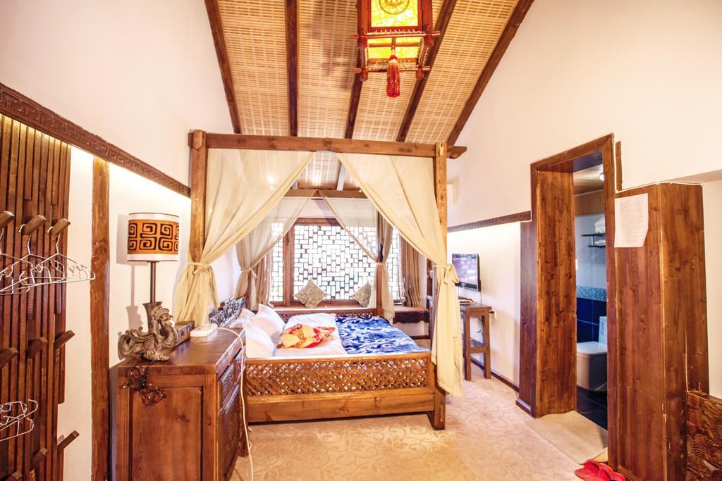 XI Tang Exquisite Hotel Лицзян Номер фото