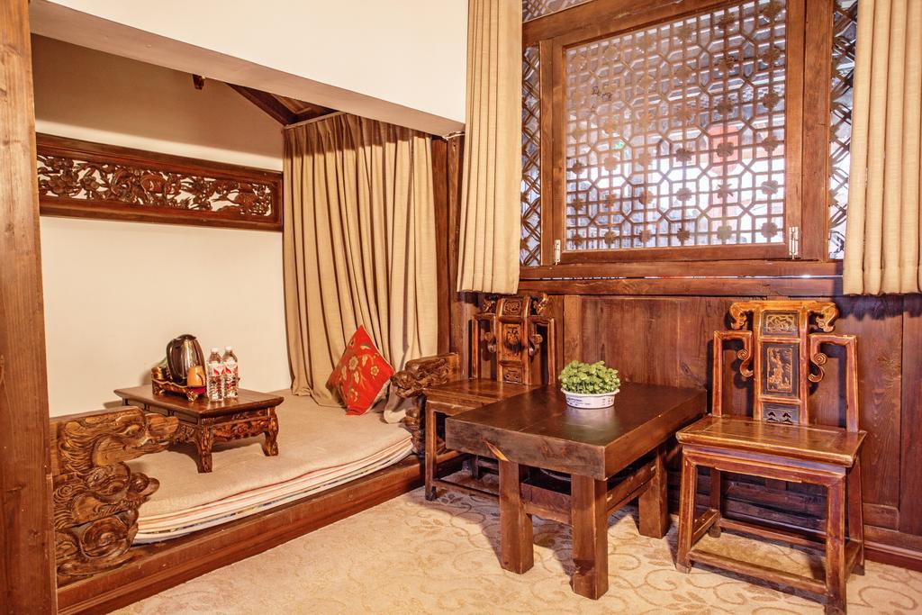 XI Tang Exquisite Hotel Лицзян Номер фото