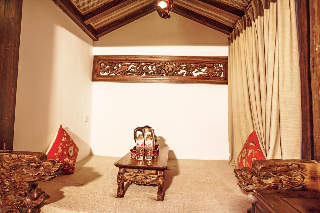 XI Tang Exquisite Hotel Лицзян Номер фото