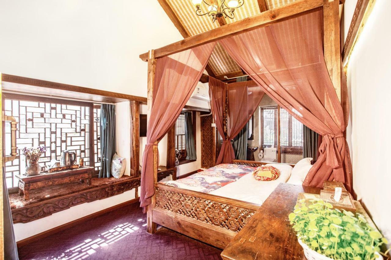 XI Tang Exquisite Hotel Лицзян Номер фото